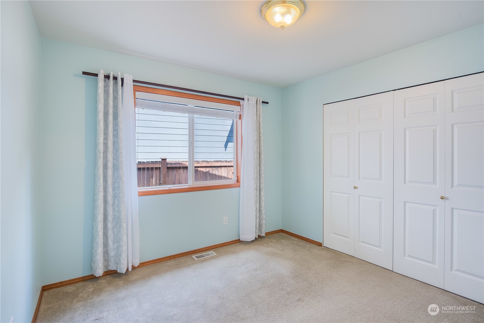 20014 34th Avenue Southeast Bothell, WA 98012 - Photo 12 of 22 an empty room with windows