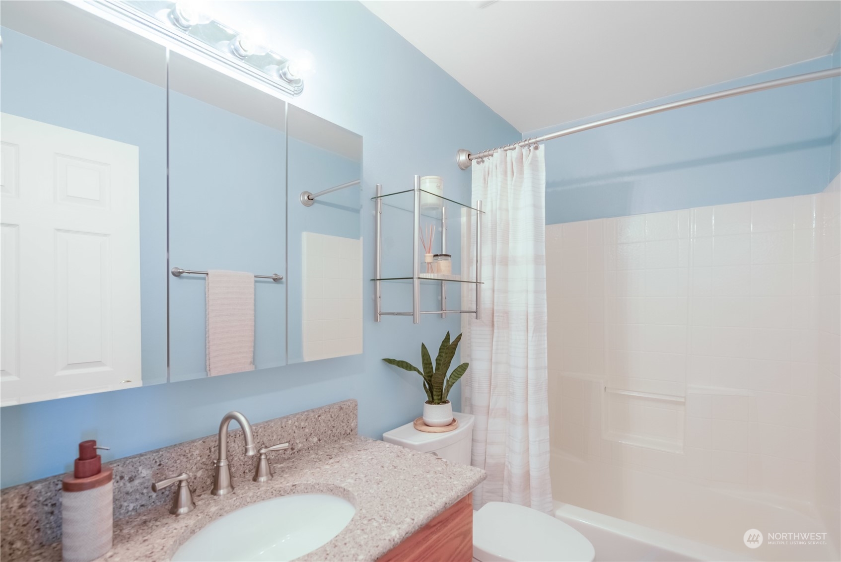 20014 34th Avenue Southeast Bothell, WA 98012 - Photo 14 of 22 a bathroom with a granite countertop shower sink and toilet