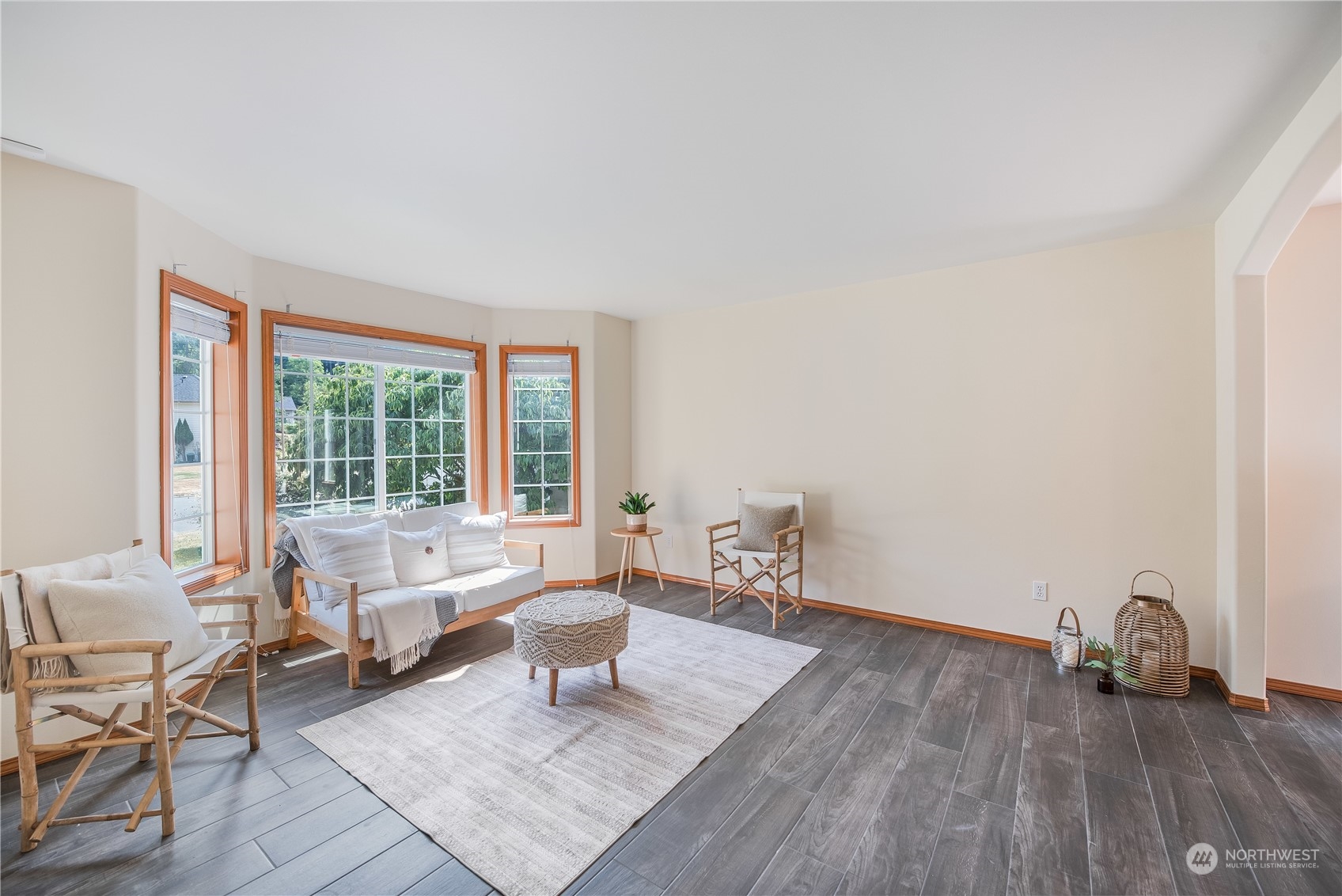 20014 34th Avenue Southeast Bothell, WA 98012 - Photo 5 of 22 a living room with furniture and a window