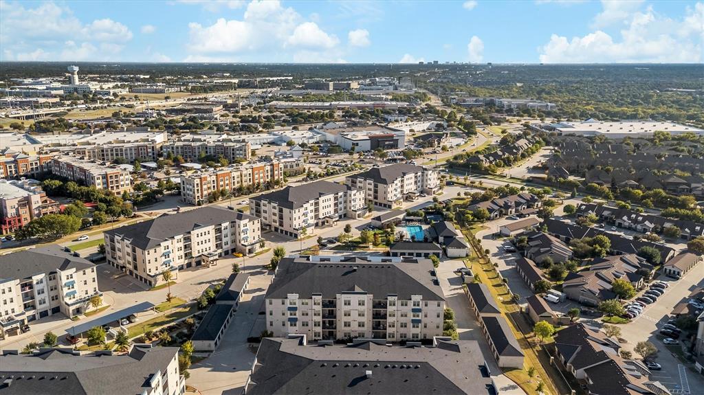 651 Watters Road, Unit 7202 Allen, TX 75013 - Photo 28 of 33 an aerial view of residential building with ocean view
