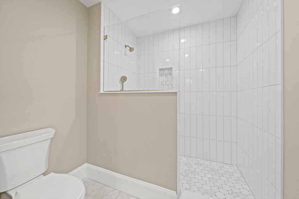 45 Red Gold Farm Road Marshfield, MA 02050 - Photo 21 of 40 a bathroom with a toilet and a shower