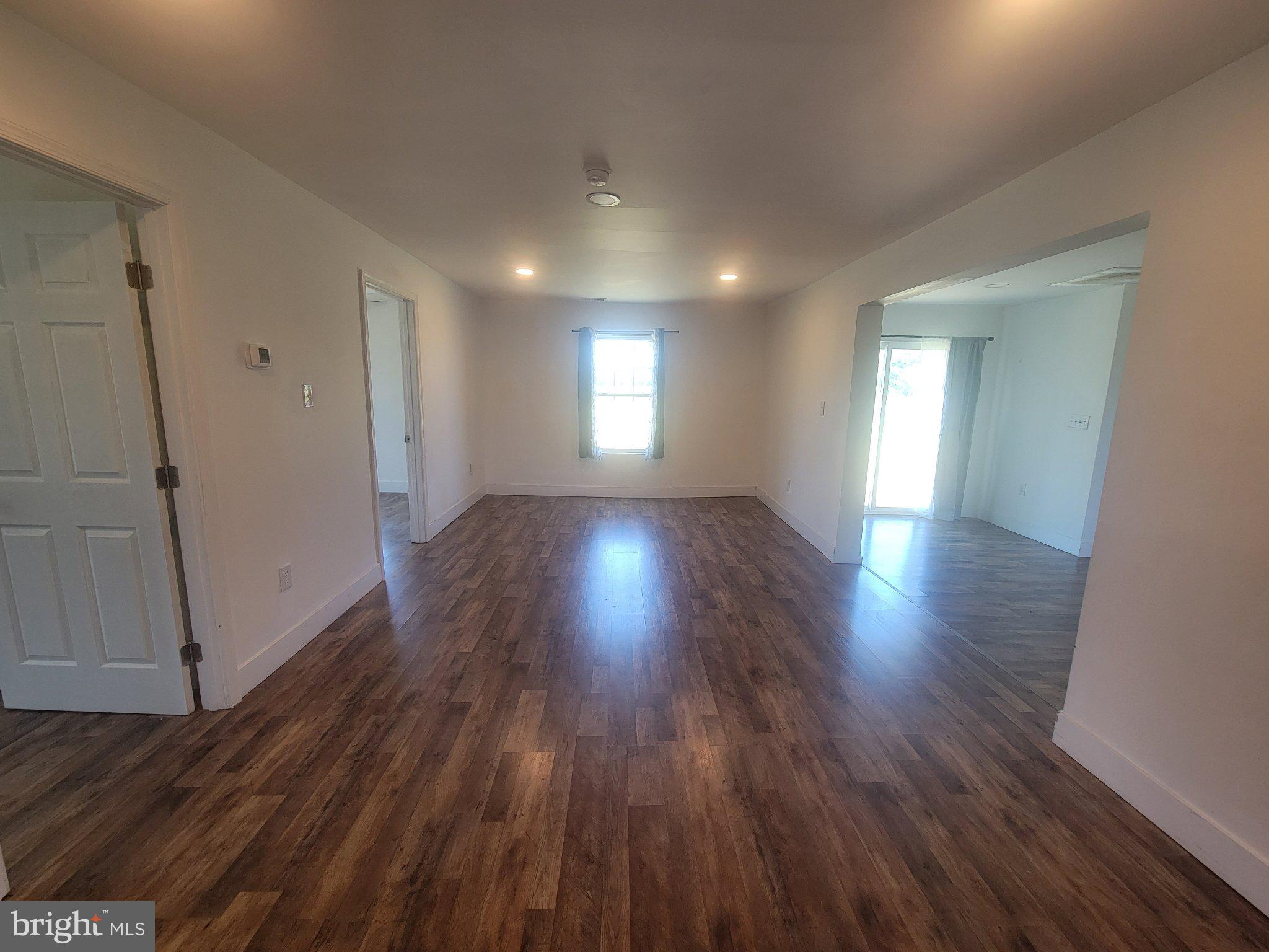 4658 White Marsh Road Madison, MD 21648 - Photo 19 of 25 Spacious, sunlit open living area.