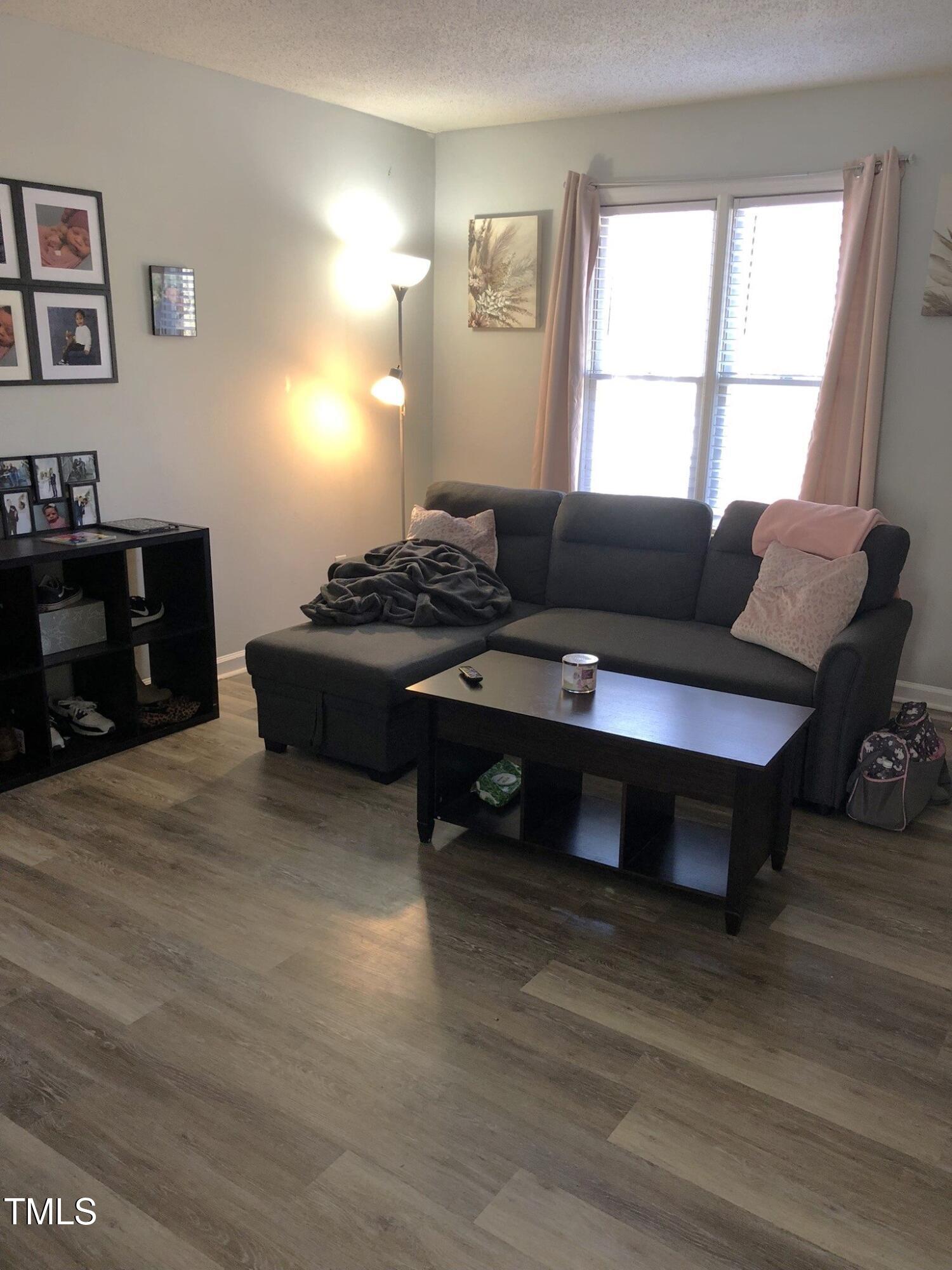 5320 Wayne Street Raleigh, NC 27606 - Photo 3 of 23 3- Unit A living room 2