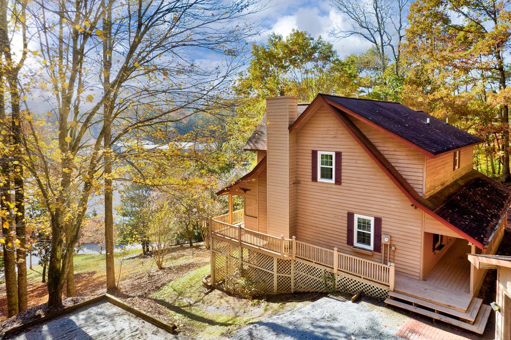 a backyard of a house with lots of trees