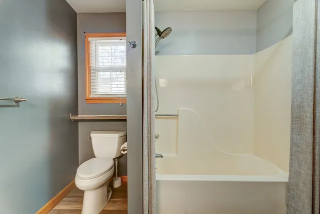 a view of entryway and kitchen