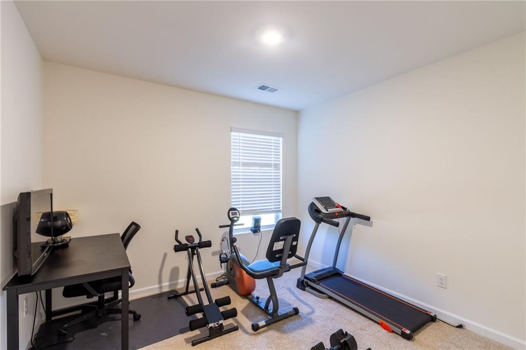 4282 Callum Court Decatur, GA 30034 - Photo 19 of 30 a view of a workspace with furniture and a window