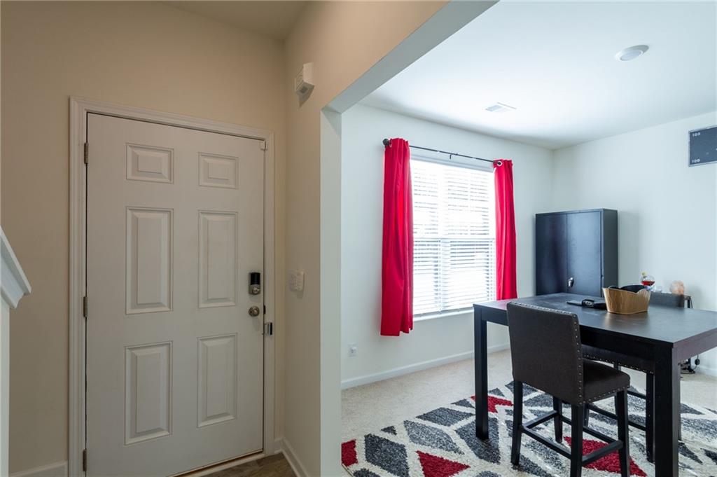 4282 Callum Court Decatur, GA 30034 - Photo 8 of 30 a view of a workspace with furniture and a window
