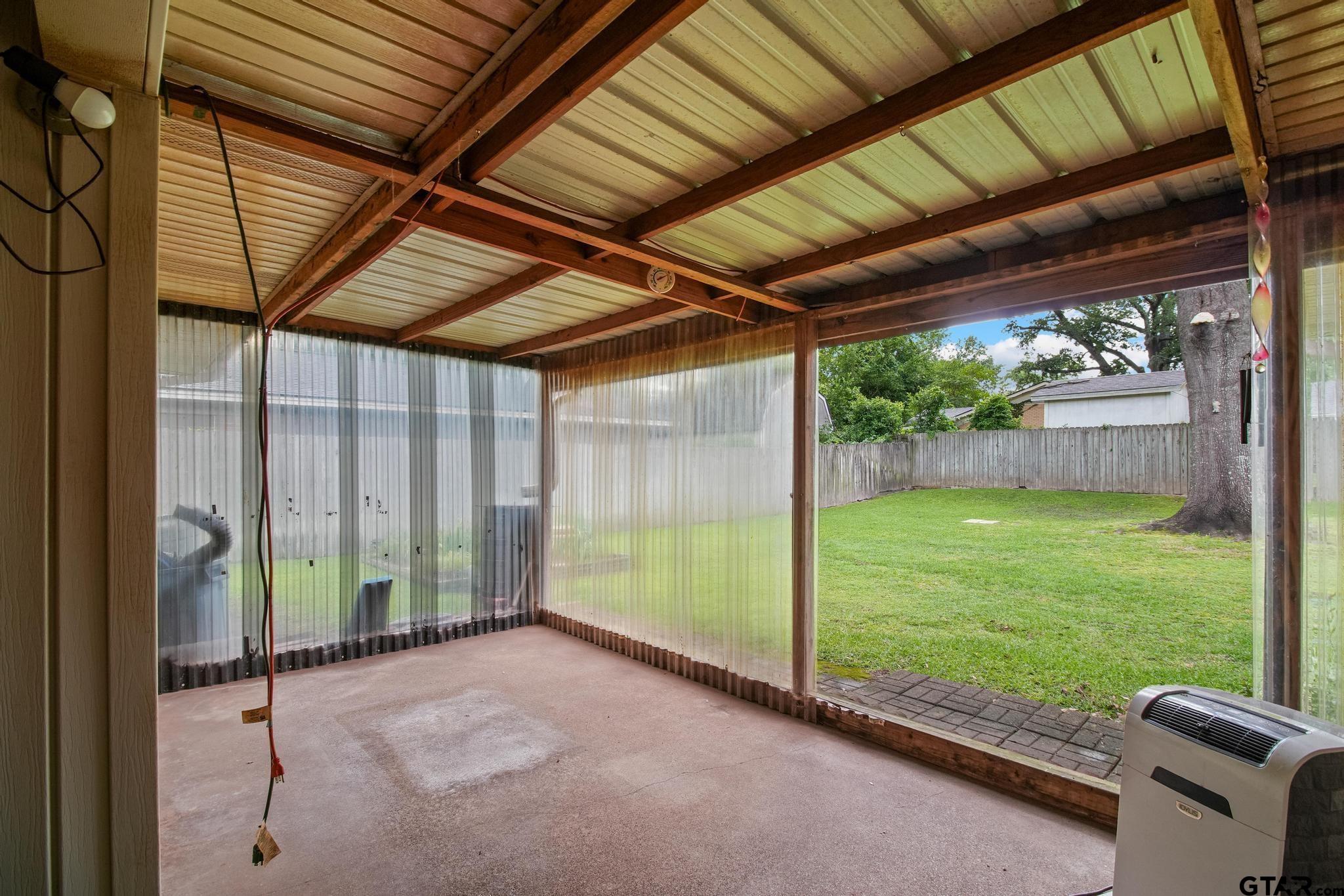 2742 Lisa Lane Tyler, TX 75701 - Photo 26 of 32 a view of backyard with green space