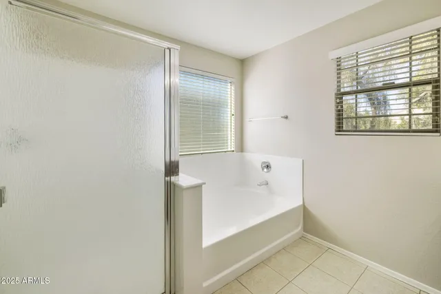 a view of a kitchen with a sink and a window