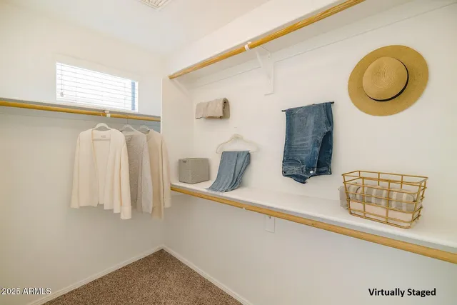 a kitchen with stainless steel appliances granite countertop a sink a stove and a microwave