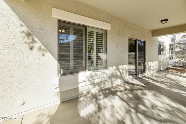 a view of an empty room and entryway