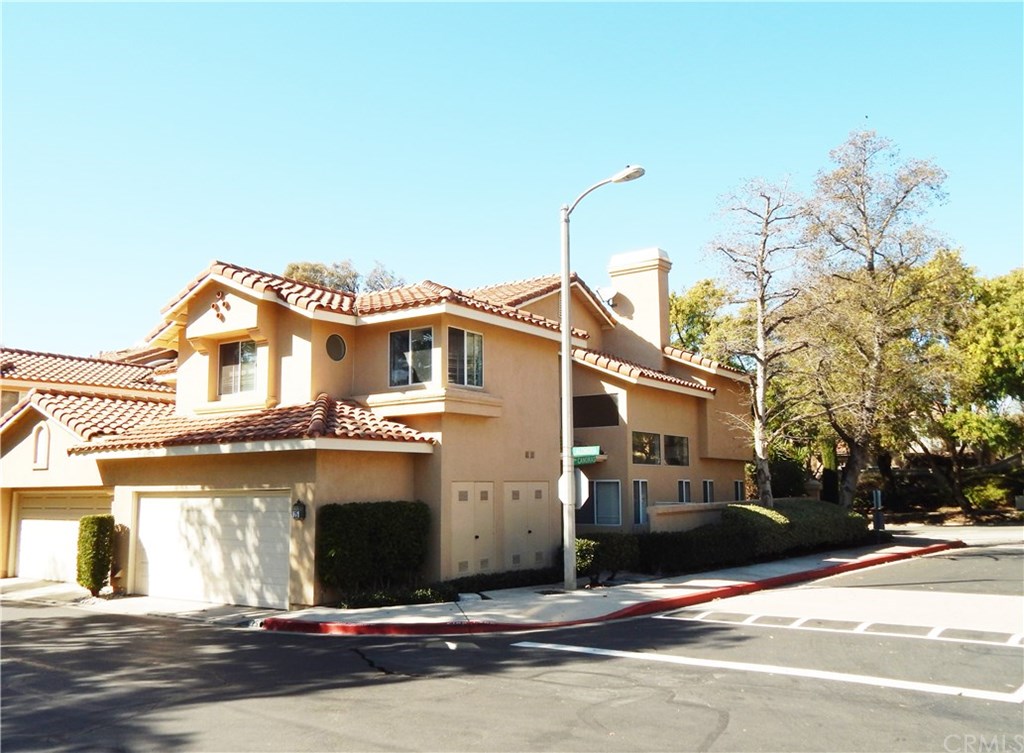 a view of a building with a street