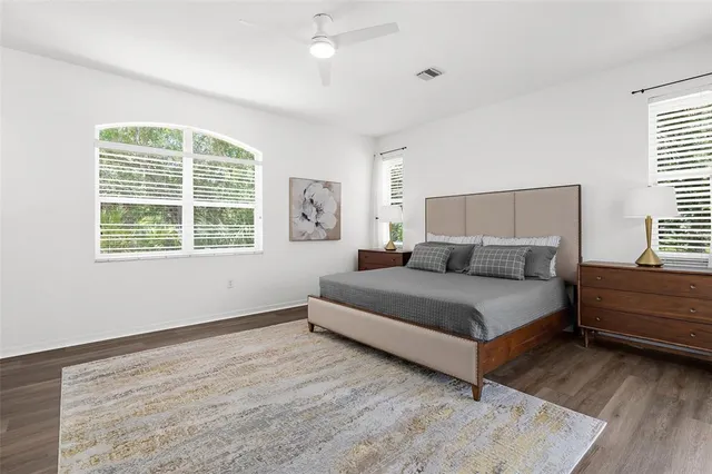 a bathroom with a shower and closet