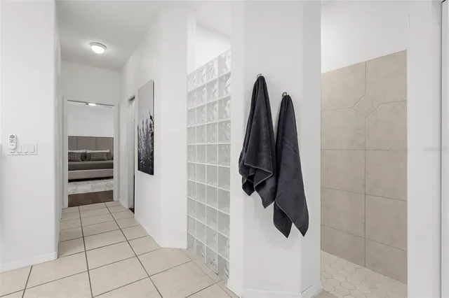 a kitchen with stainless steel appliances granite countertop a refrigerator a stove top oven a sink and dishwasher