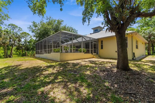 a bedroom with a bed and a desk