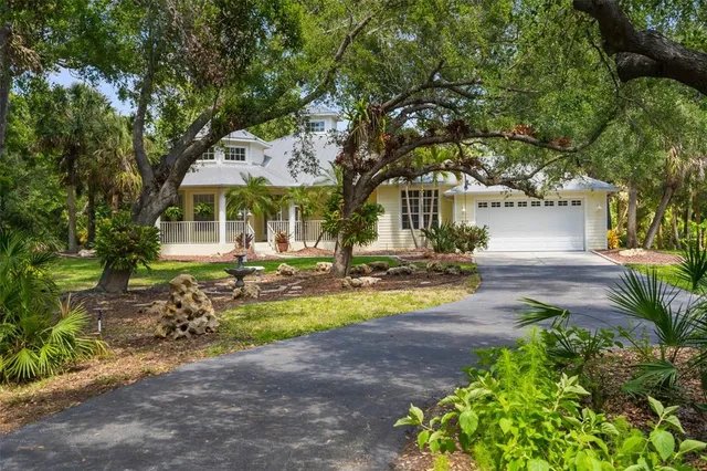 a view of a building with a yard