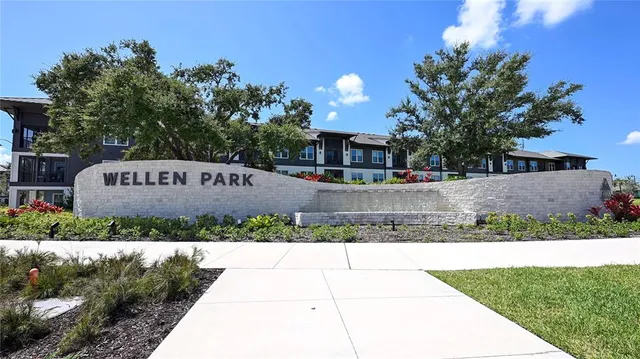 a sign on the side of a street