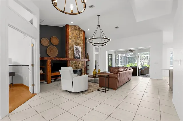 a spacious bedroom with a bed and a window