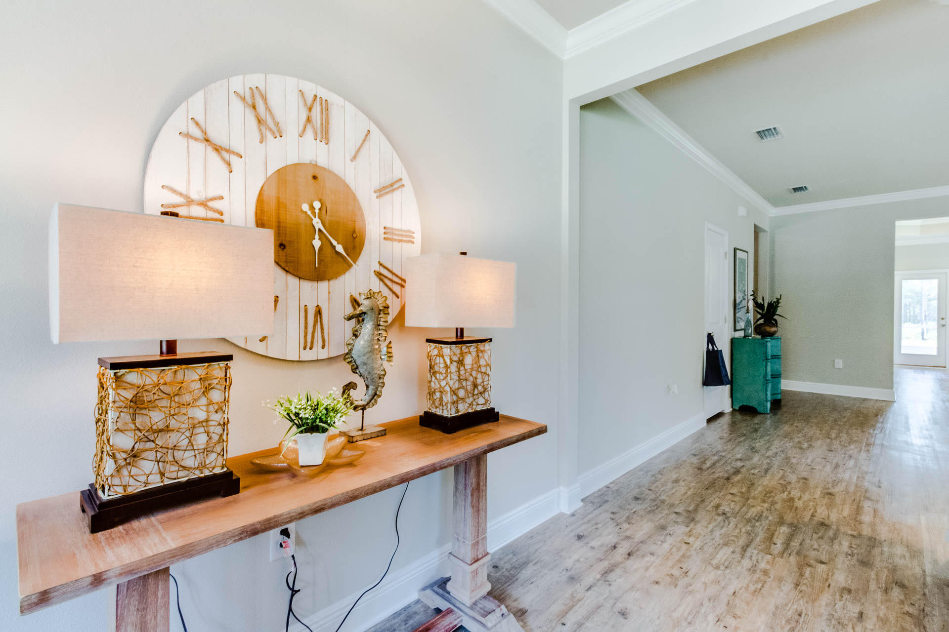 219 Southern Pnes Road Santa Rosa Beach, FL 32459 - Photo 6 of 28 an entryway with wooden floor