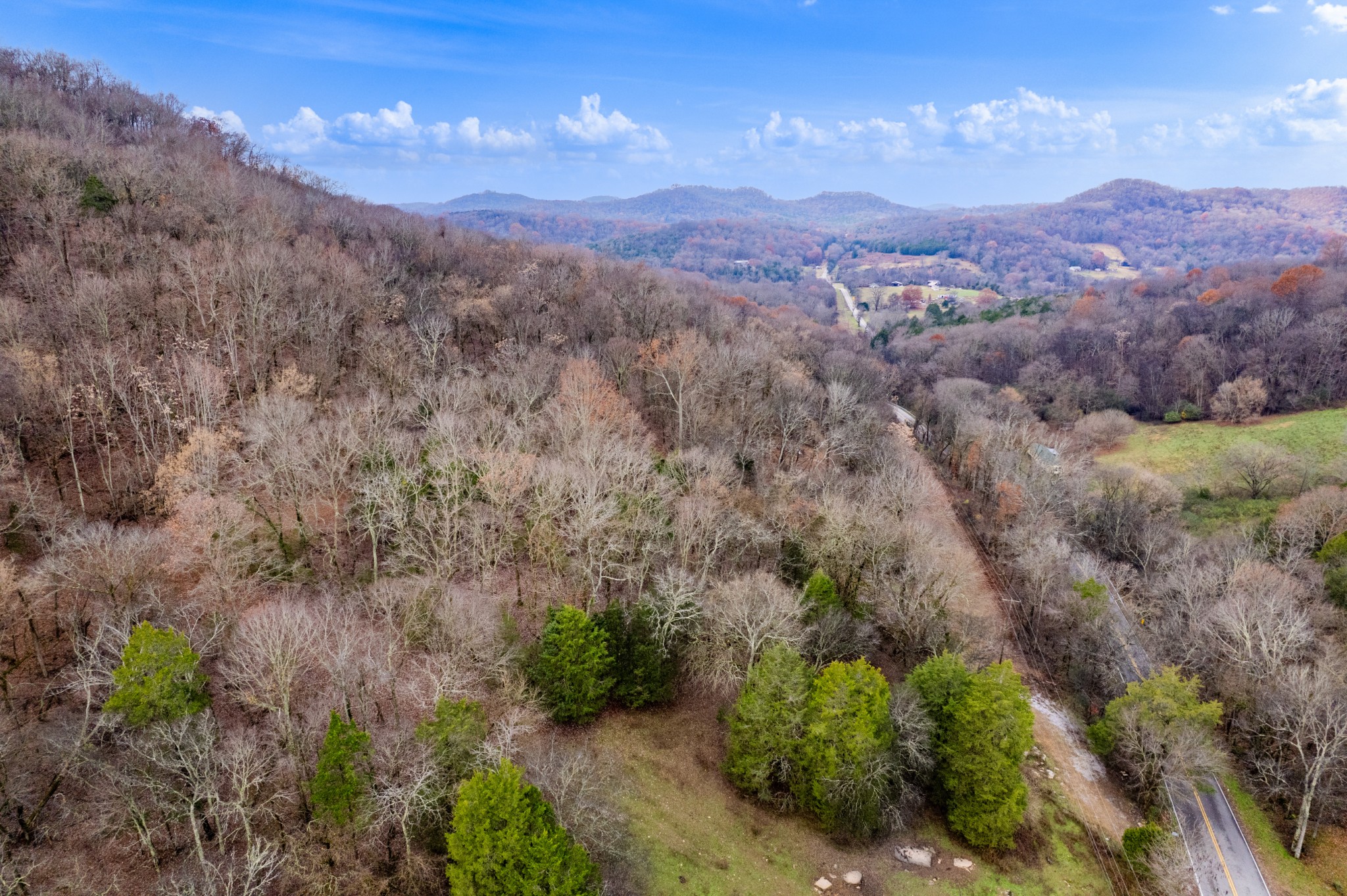 0 Fort Blount Road Dixon Springs, TN 37057 - Photo 16 of 37 a view of a city with mountains in the background