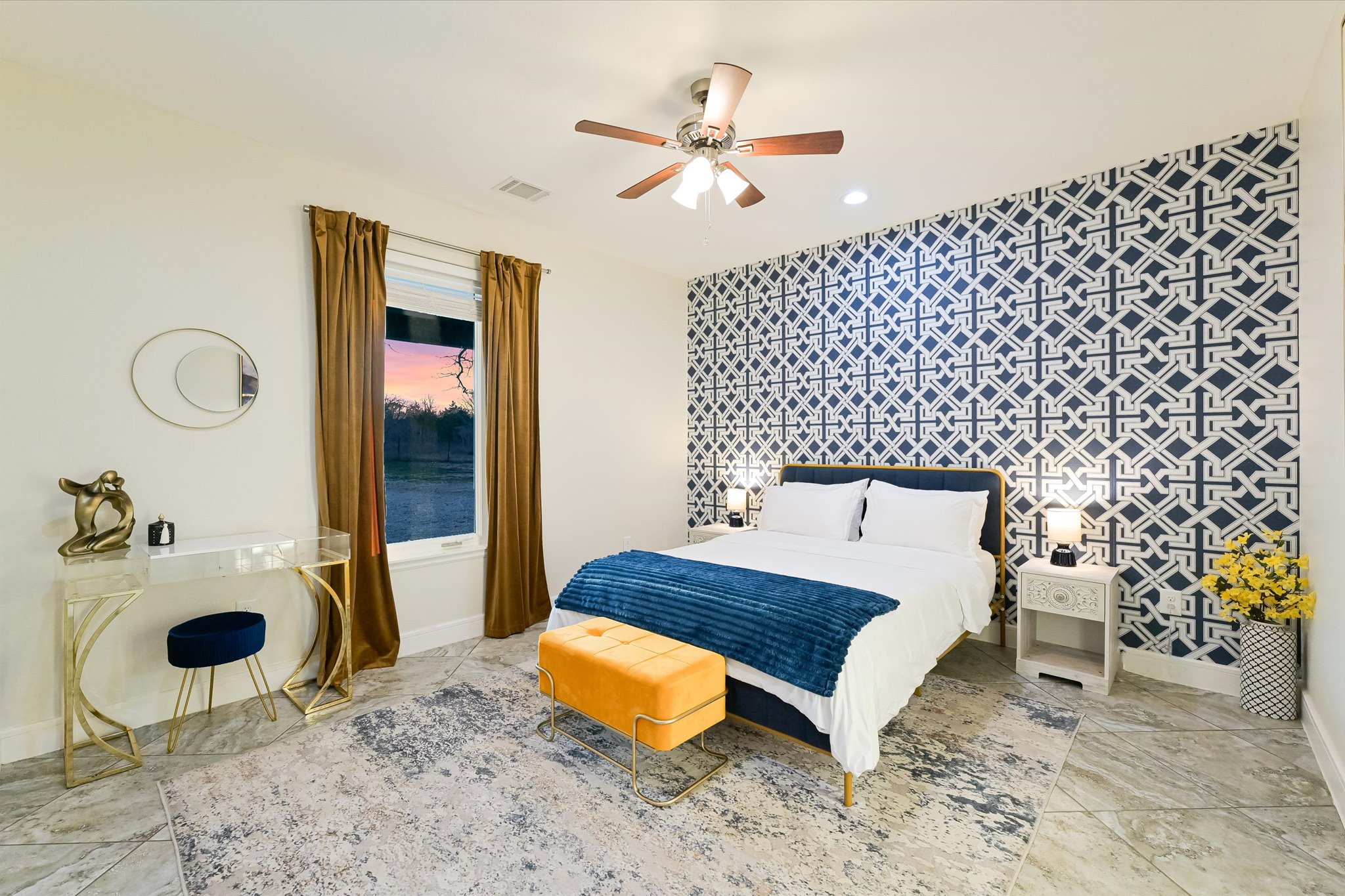 8400 Taylorsville Road Dale, TX 78616 - Photo 12 of 38 Bedroom with an accent wall and a ceiling fan