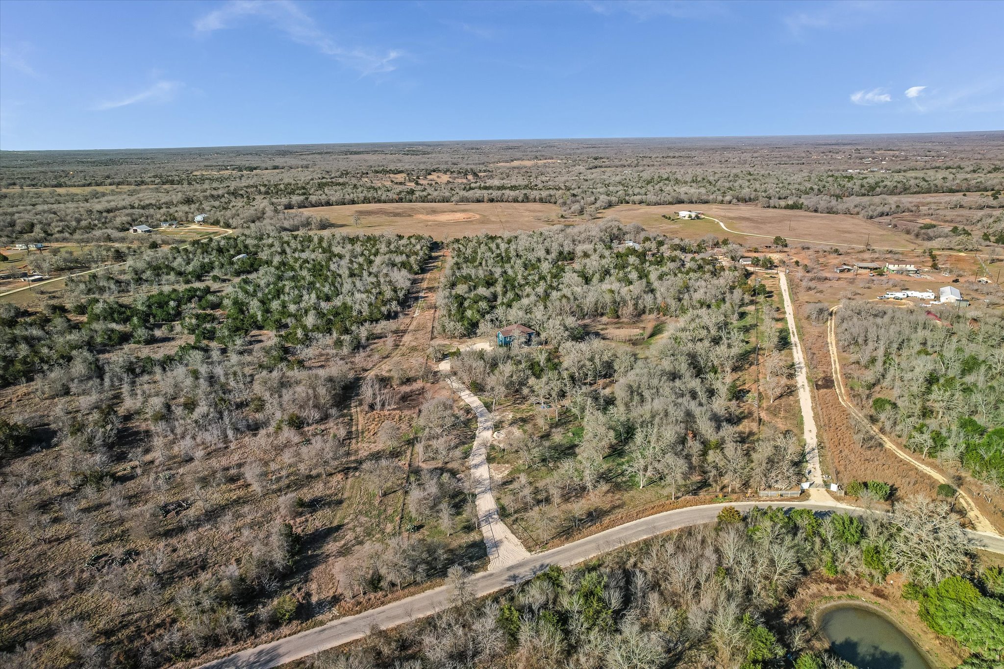 8400 Taylorsville Road Dale, TX 78616 - Photo 30 of 38 Overview of rural landscape featuring a forest