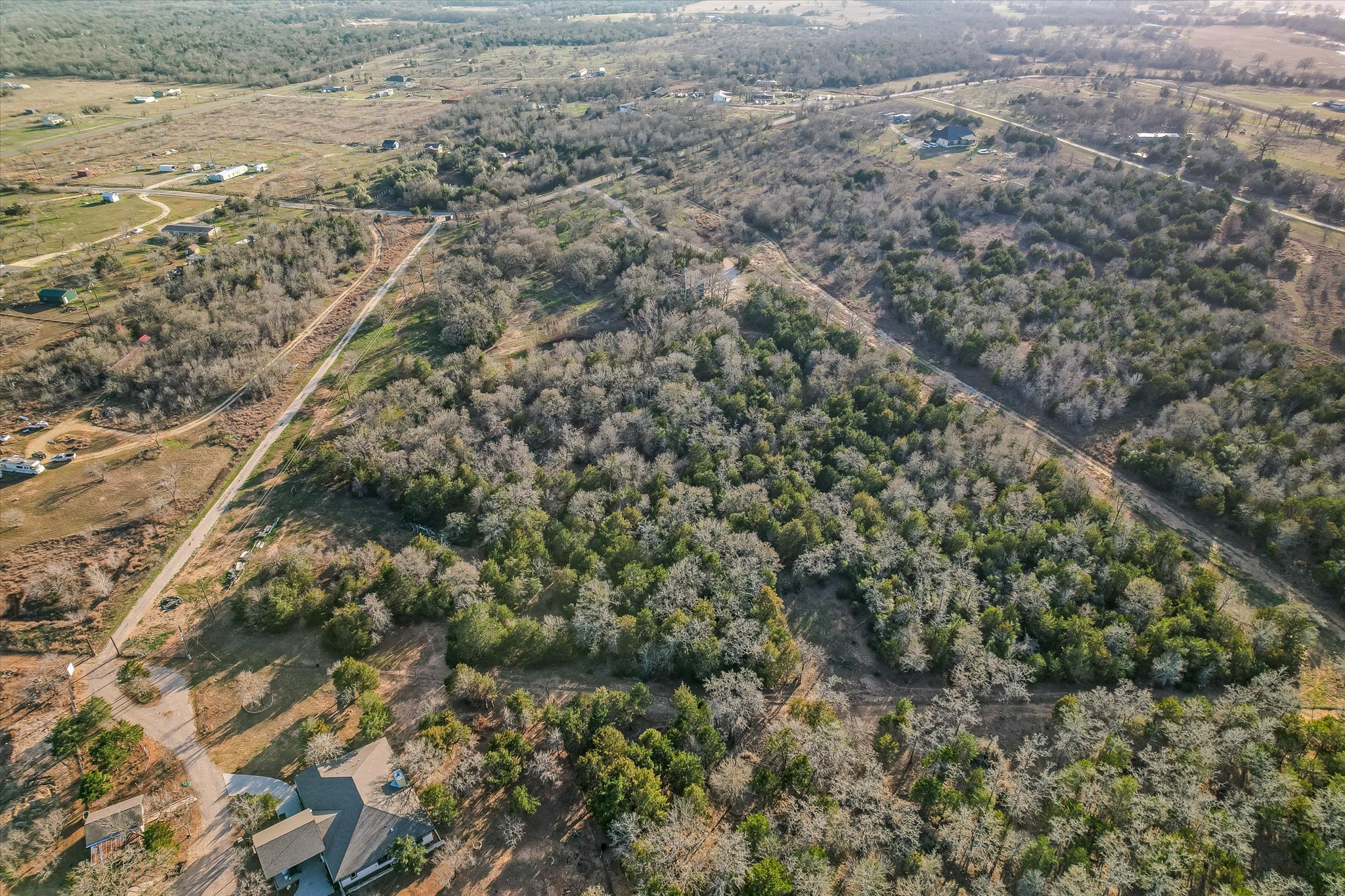 8400 Taylorsville Road Dale, TX 78616 - Photo 34 of 38 View of rural area with a forest