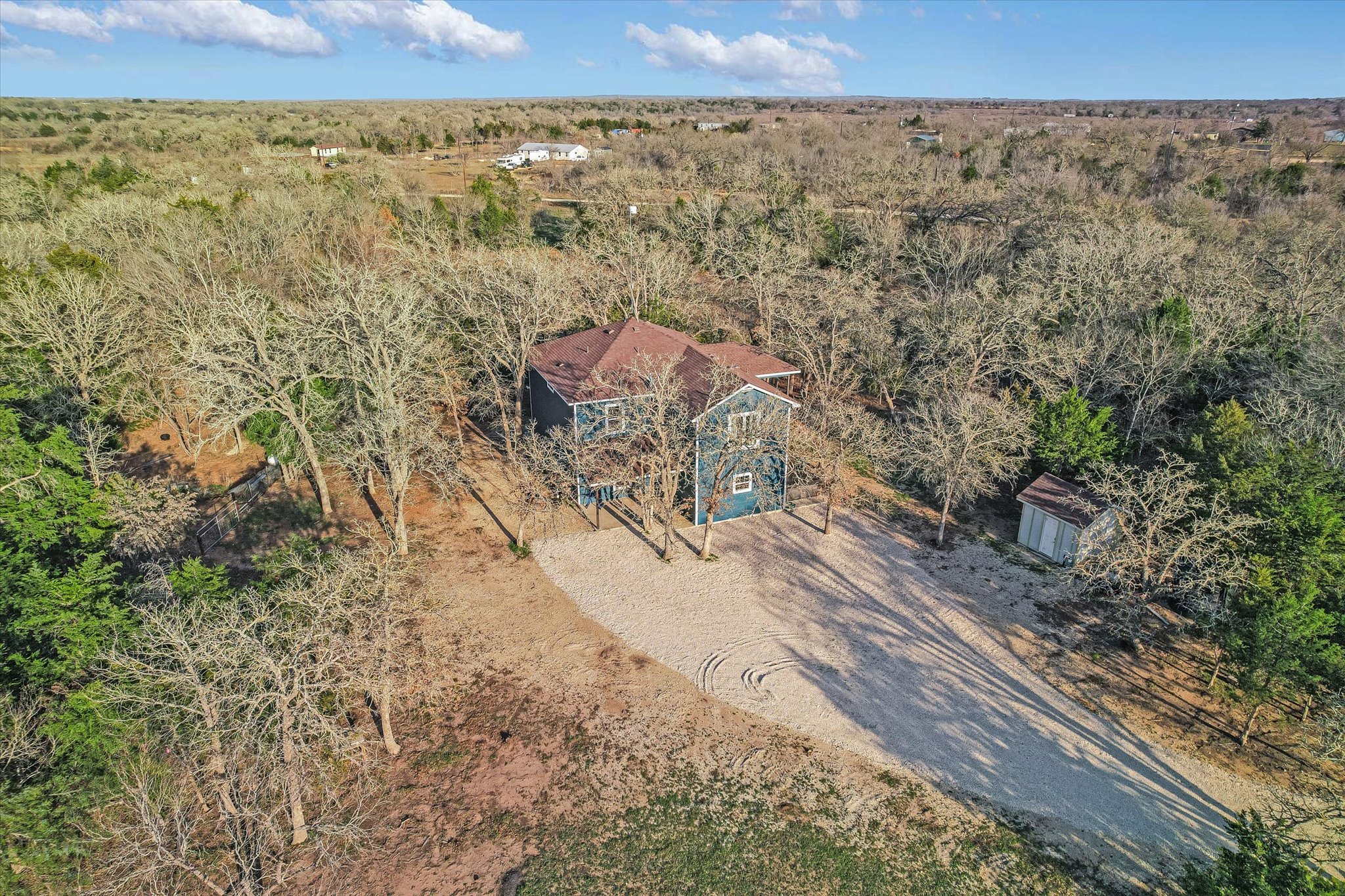 8400 Taylorsville Road Dale, TX 78616 - Photo 37 of 38 Bird's eye view of a heavily wooded area