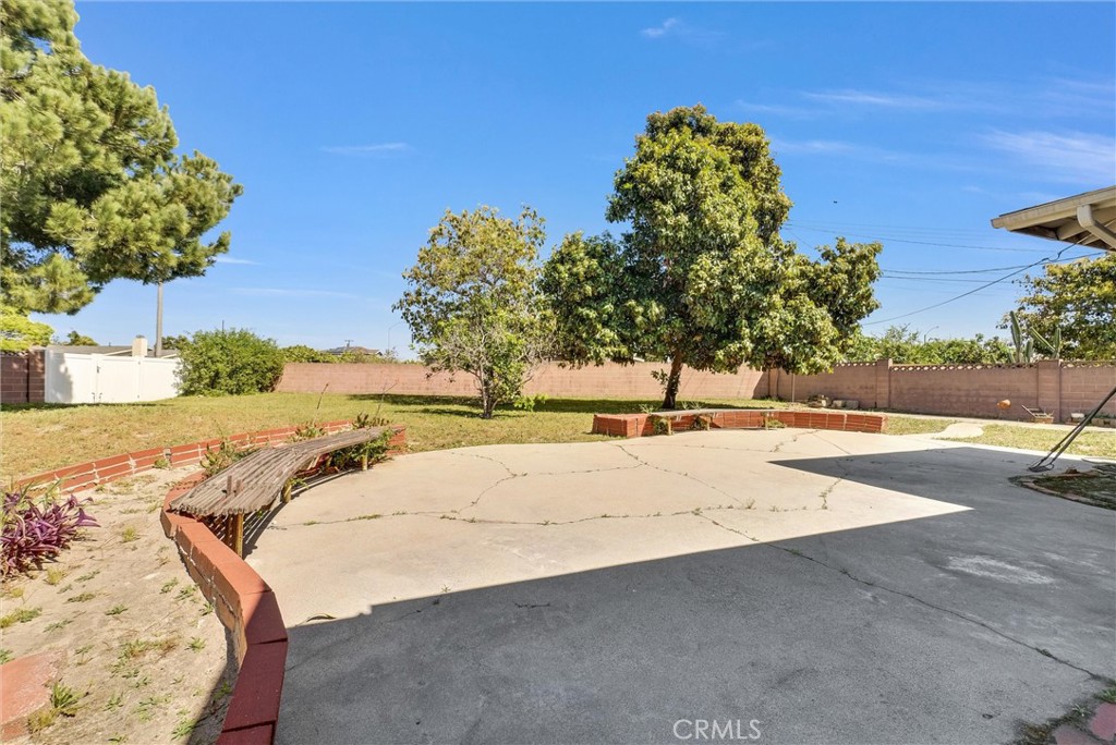 2551 Rome Avenue Anaheim, CA 92804 - Photo 24 of 27 a view of a yard with a tree