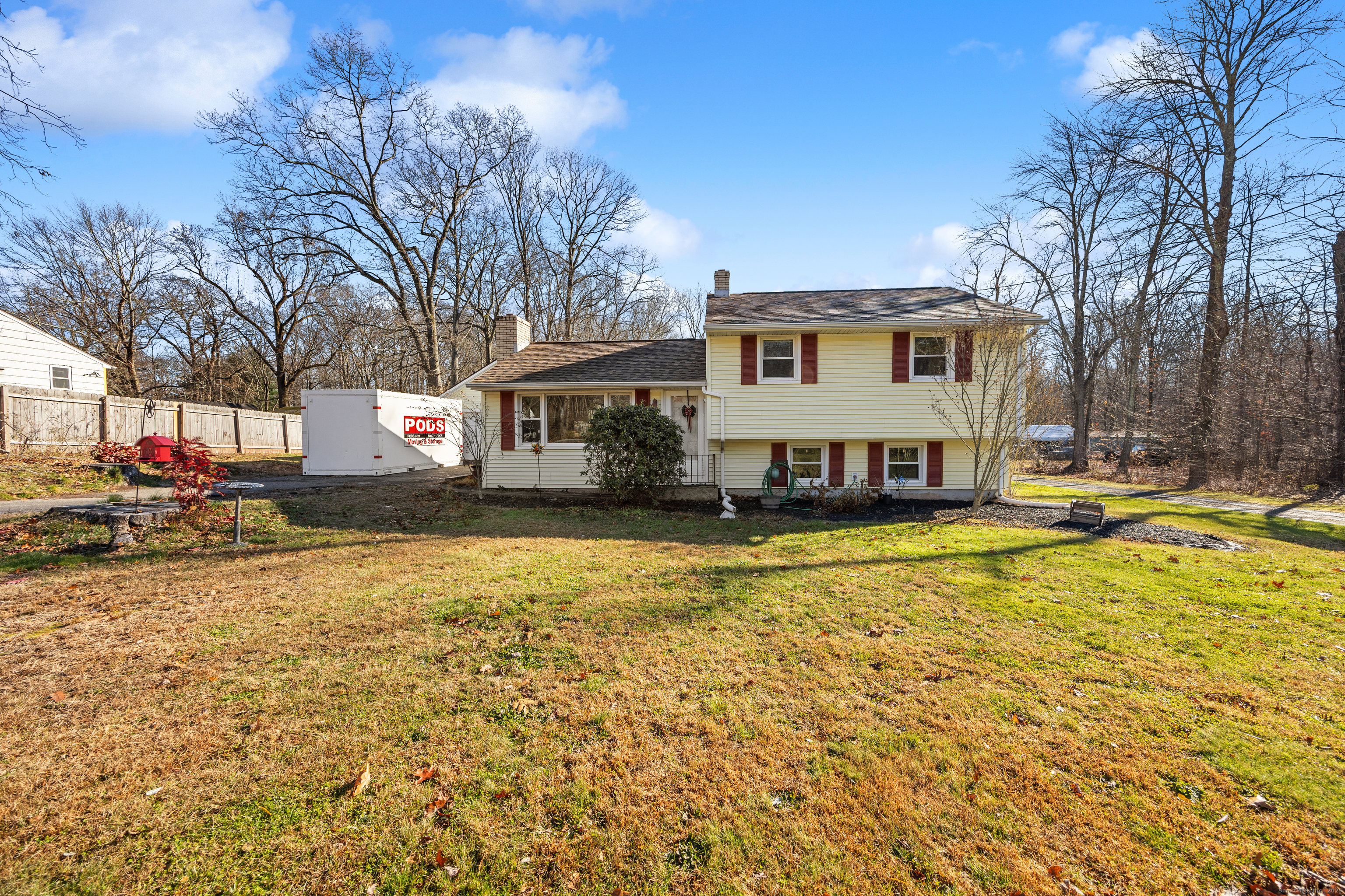 122 North Airline Road Wallingford, CT 06492 - Photo 2 of 33 a swimming pool view with large trees and pool table and chairs