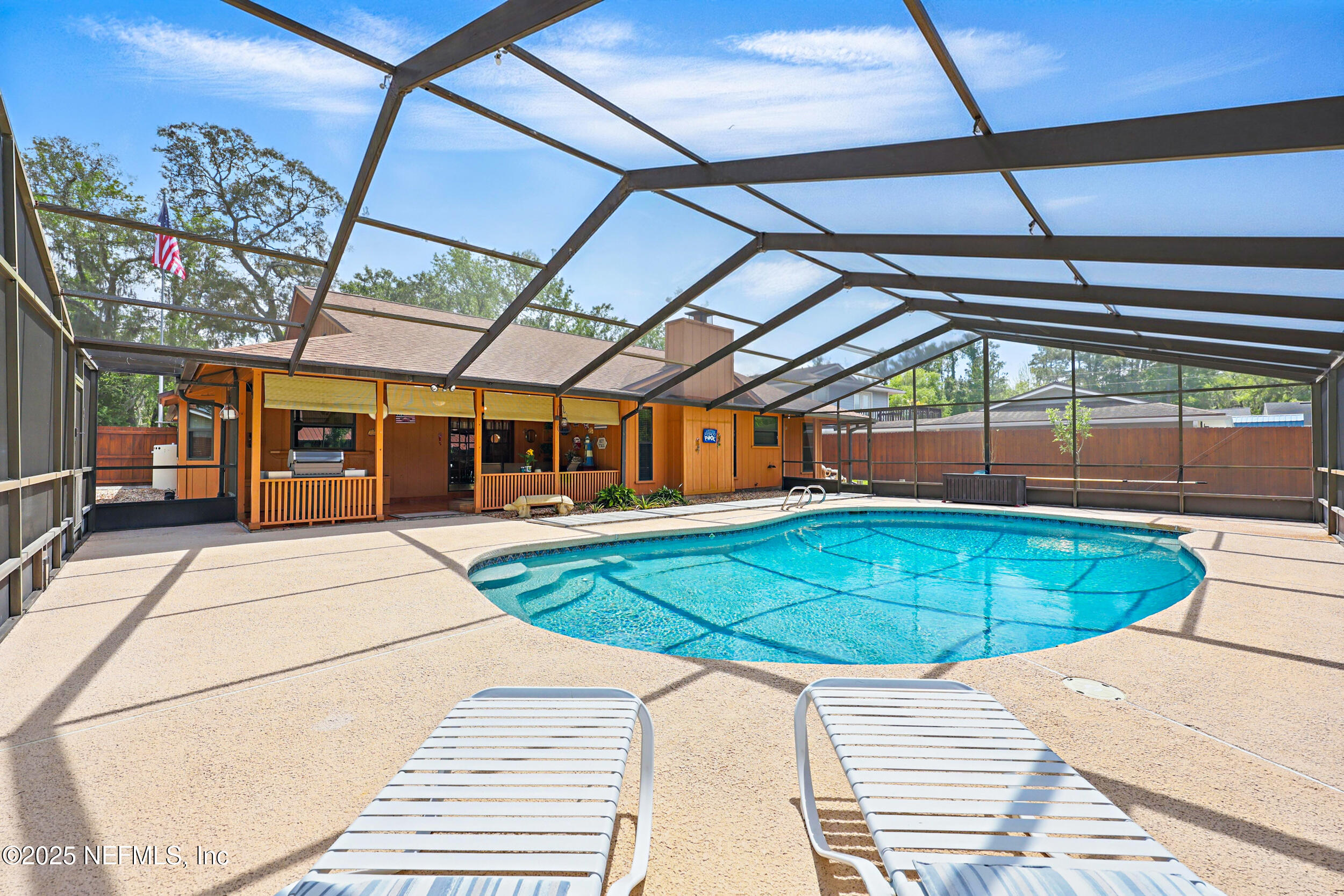 3154 Brooks Road Fleming Island, FL 32003 - Photo 36 of 53 a view of a swimming pool with a patio