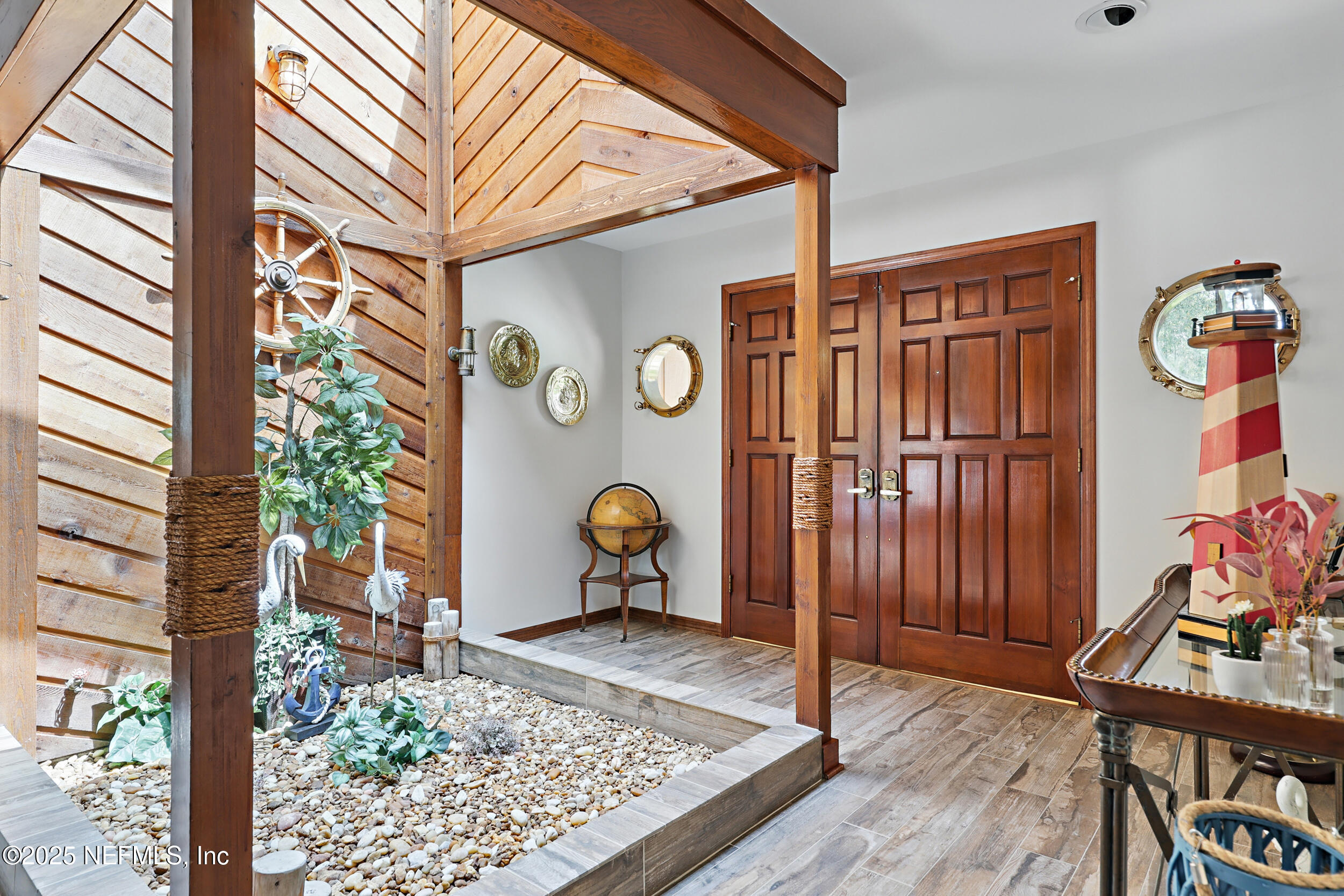 3154 Brooks Road Fleming Island, FL 32003 - Photo 4 of 53 a view of an entryway with wooden floor