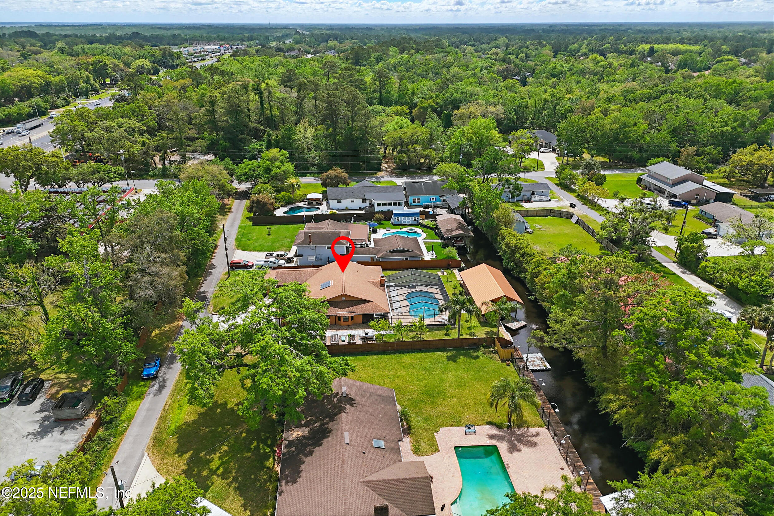 3154 Brooks Road Fleming Island, FL 32003 - Photo 48 of 53 a view of a houses with a yard
