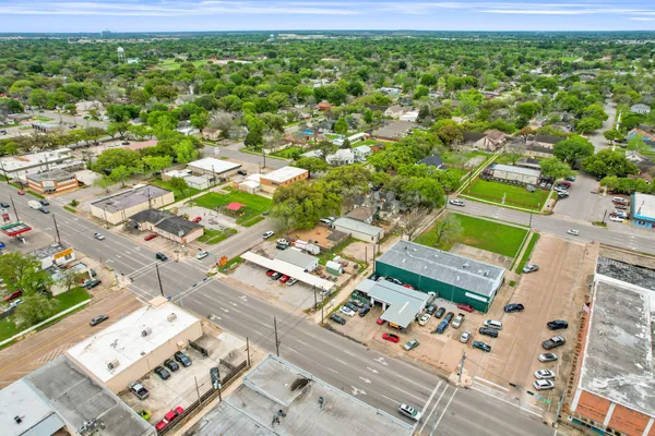 an aerial view of a house with outdoor space