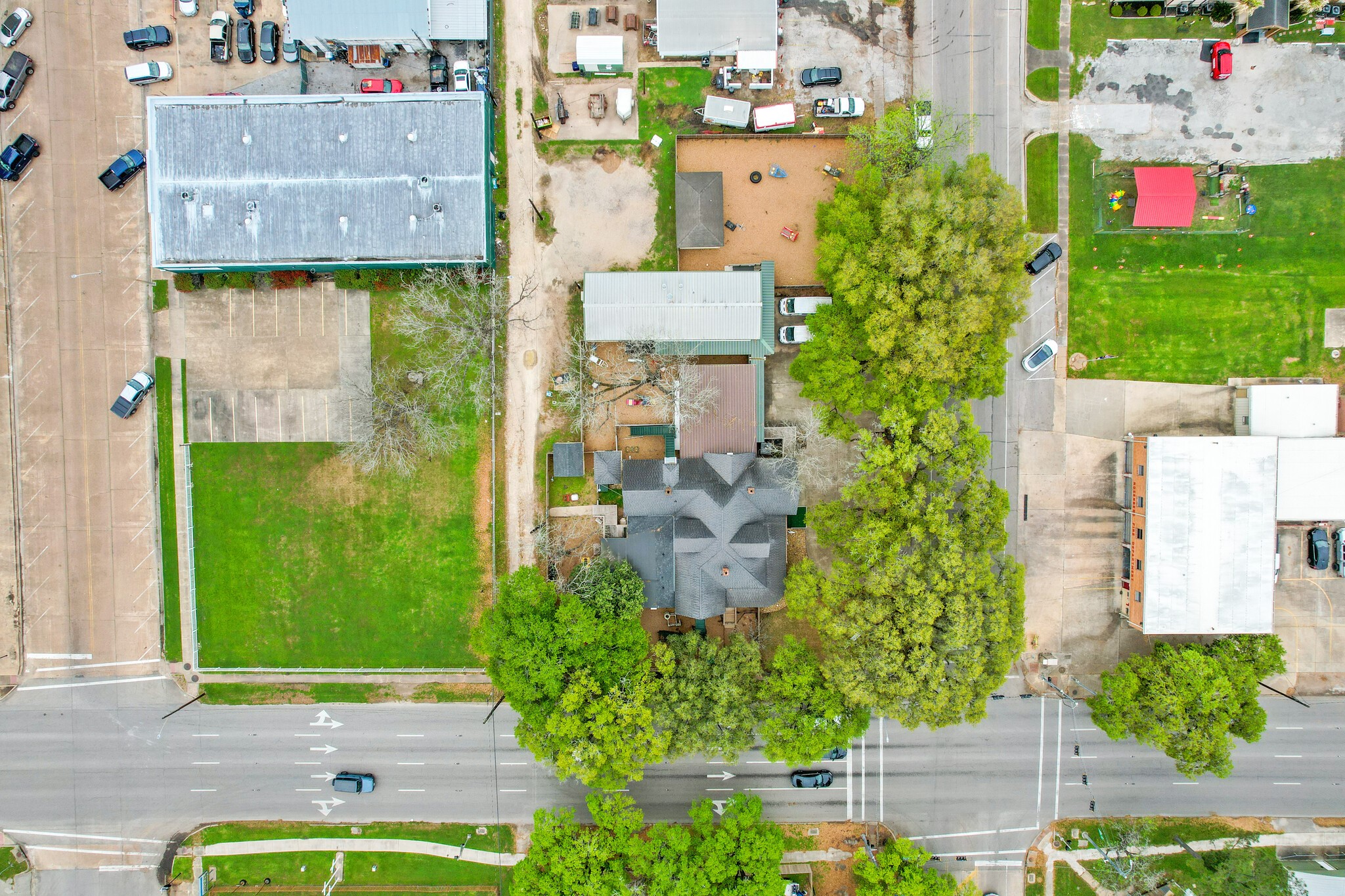 1030 4th Street Rosenberg, TX 77471 - Photo 38 of 38 an aerial view of a house with garden space and street view