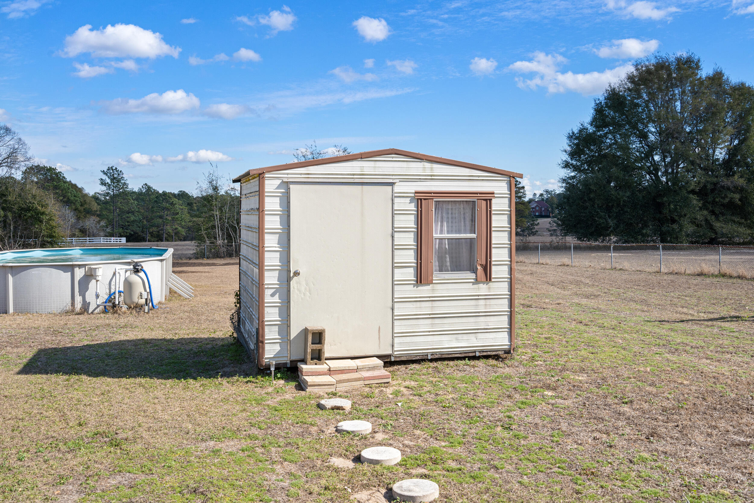 118 Stephens Lane Crestview, FL 32539 - Photo 30 of 40 Storage Shed