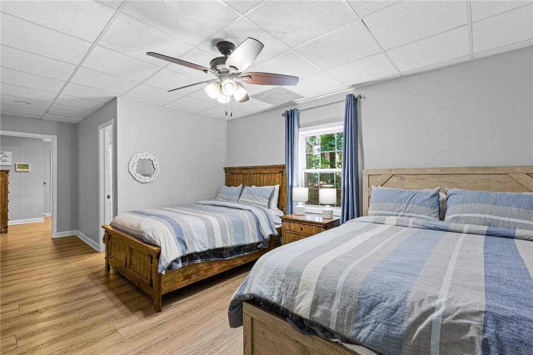 322 Shorecrest Drive Seneca, SC 29672 - Photo 26 of 30 This inviting bedroom features light wood flooring and ample natural light, perfect for restful nights.