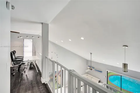 a view of a hallway with closet