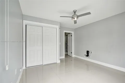 a view of a livingroom with furniture and a chair