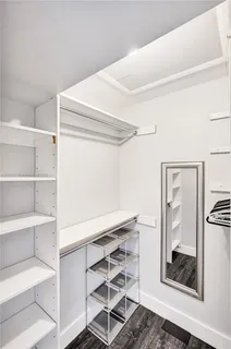 a bathroom with a toilet a sink and shower