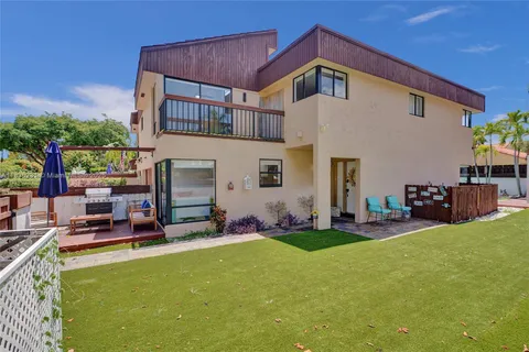 front view of a house with a small yard