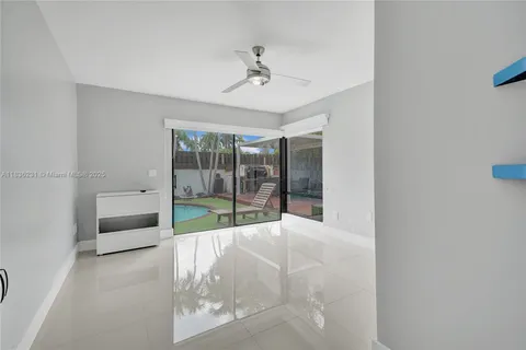 a view of staircase with white walls and windows