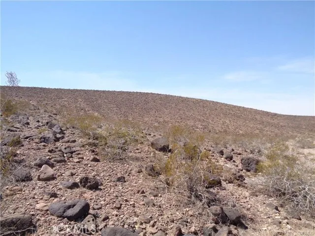 1 Rocky View Road Daggett, CA 92327 - Photo 6 of 13 an aerial view of house with yard and mountain view in back