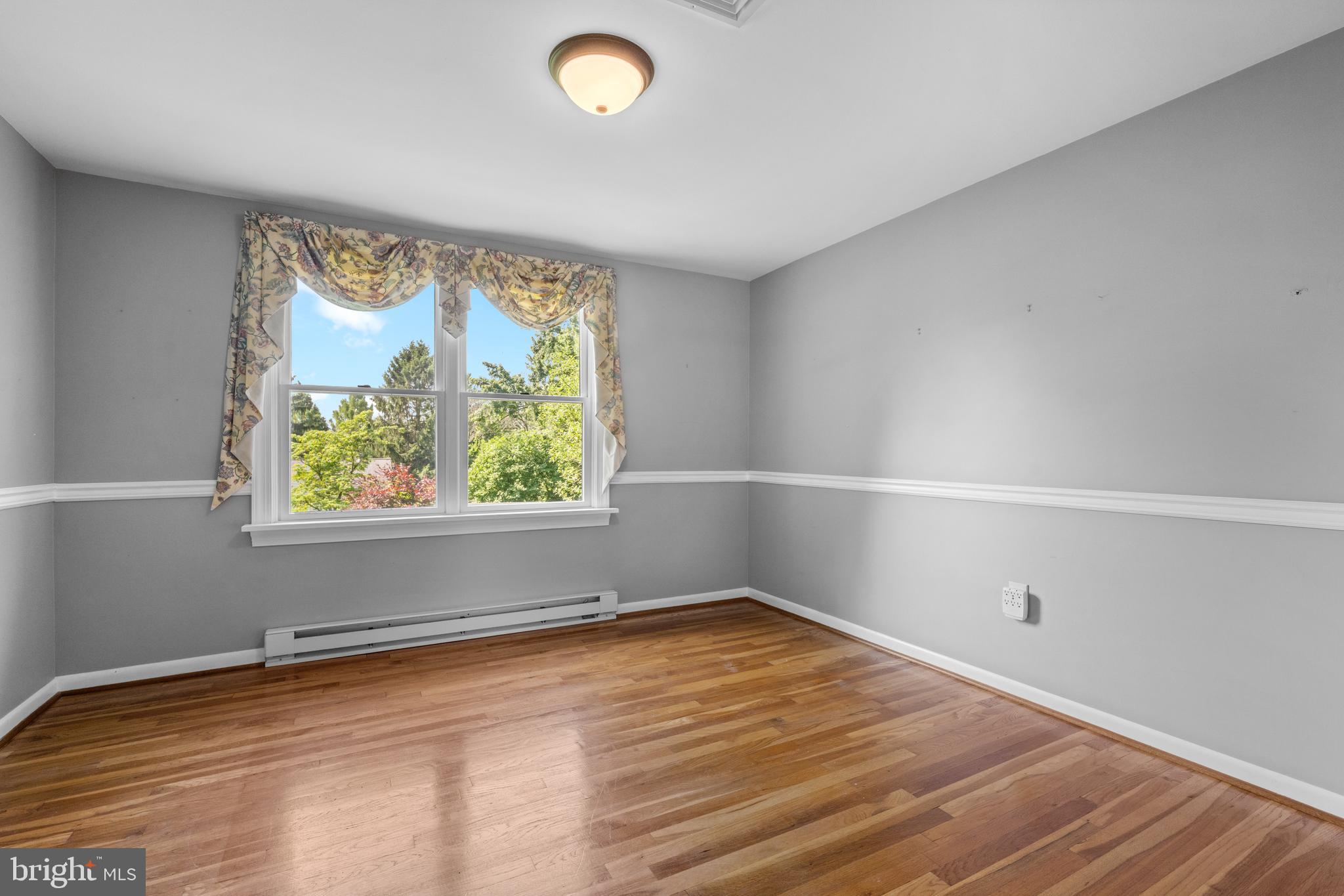 258 Monacy Road Coatesville, PA 19320 - Photo 24 of 54 a view of a room with wooden floor and window