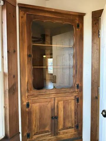a kitchen with stainless steel appliances granite countertop a sink and a white cabinets