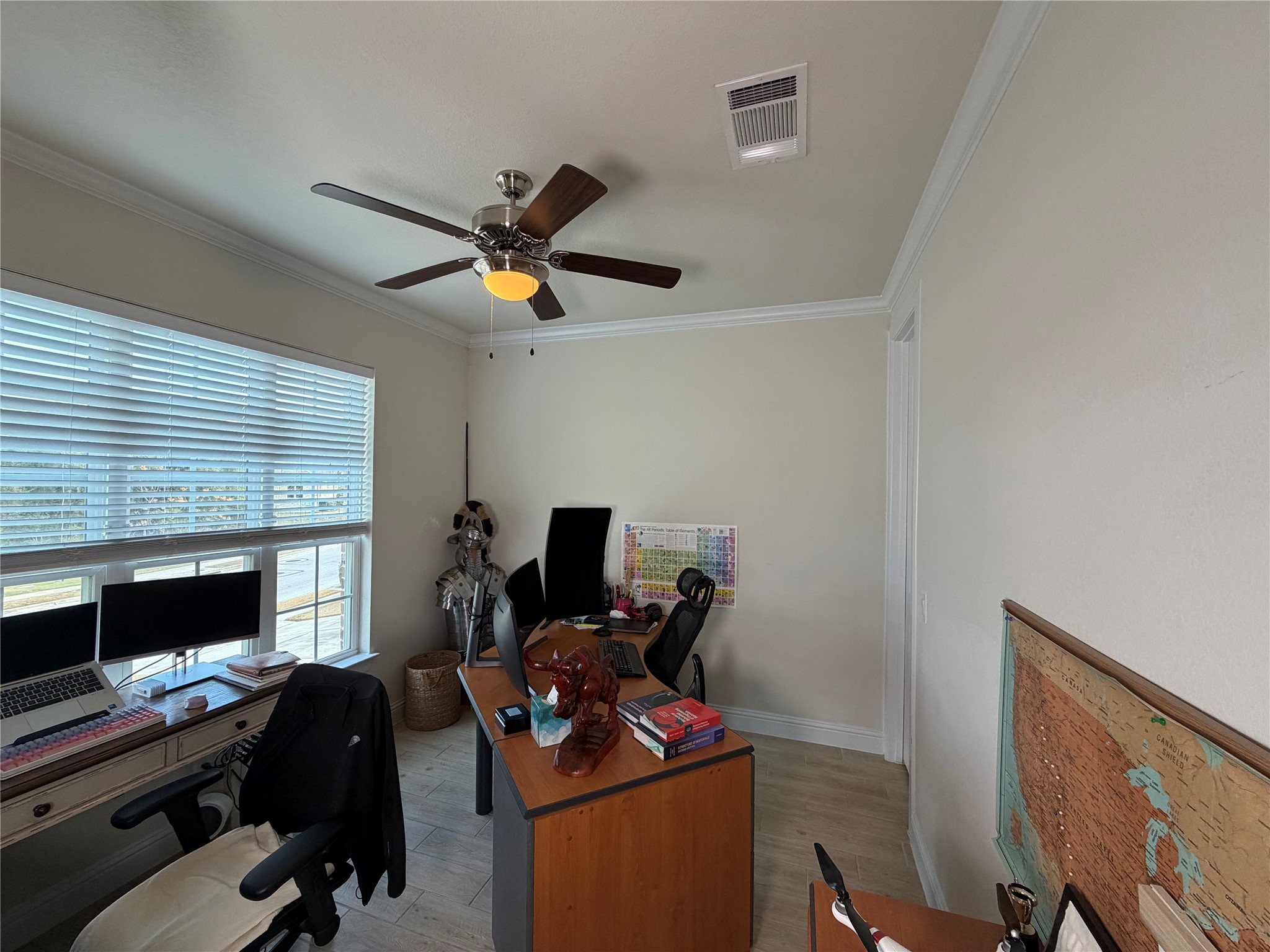 8709 Moccasin Path Austin, TX 78736 - Photo 5 of 34 Office space featuring a ceiling fan, light wood-type flooring, and crown molding