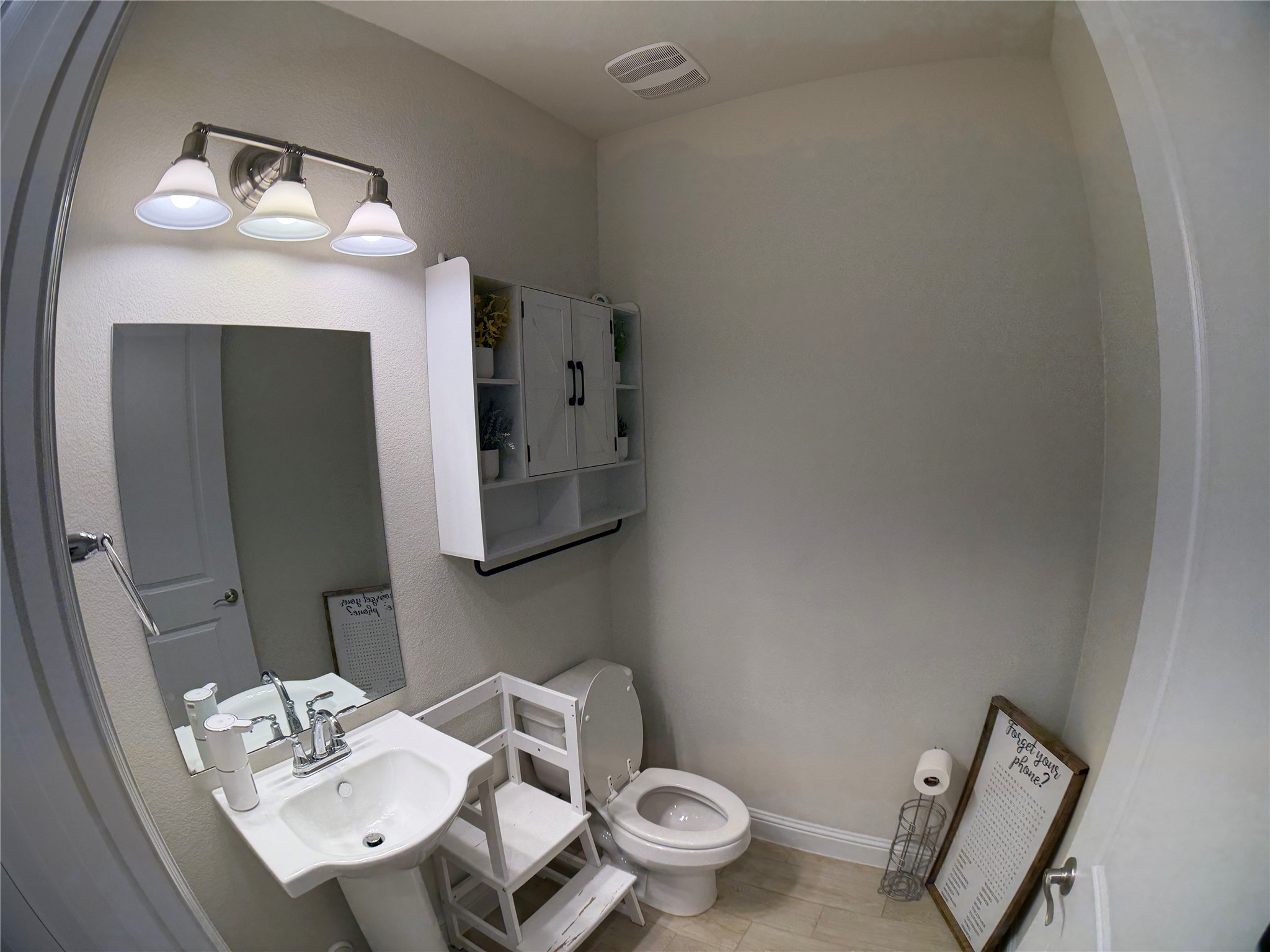 8709 Moccasin Path Austin, TX 78736 - Photo 6 of 34 Half bath featuring toilet and baseboards