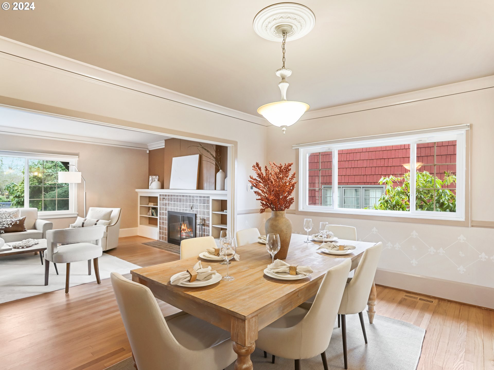 116 West 29th Street Vancouver, WA 98660 - Photo 11 of 35 a dining room with furniture a chandelier and wooden floor