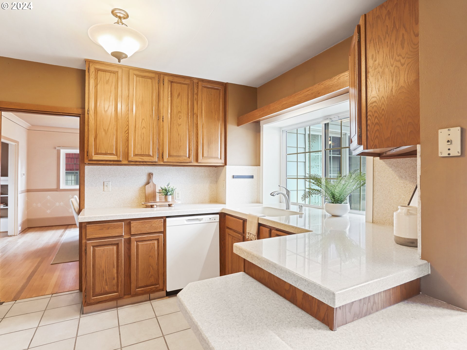 116 West 29th Street Vancouver, WA 98660 - Photo 14 of 35 a kitchen with a sink cabinets and window