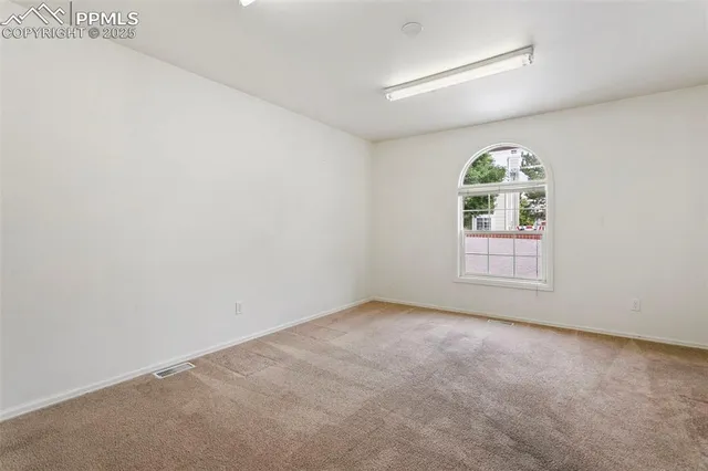 an empty room with a window